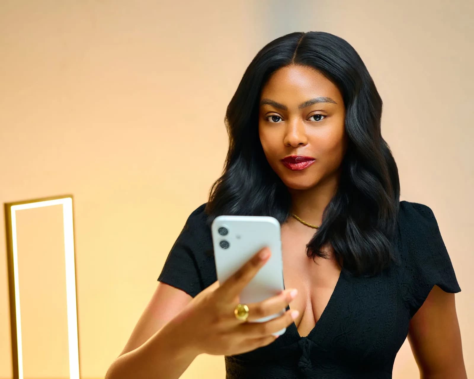 Woman holding her phone